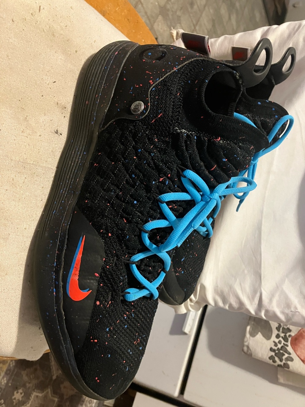 NIKE. Sz 13. Used , but in great condition black , blue n red speckled sneakers